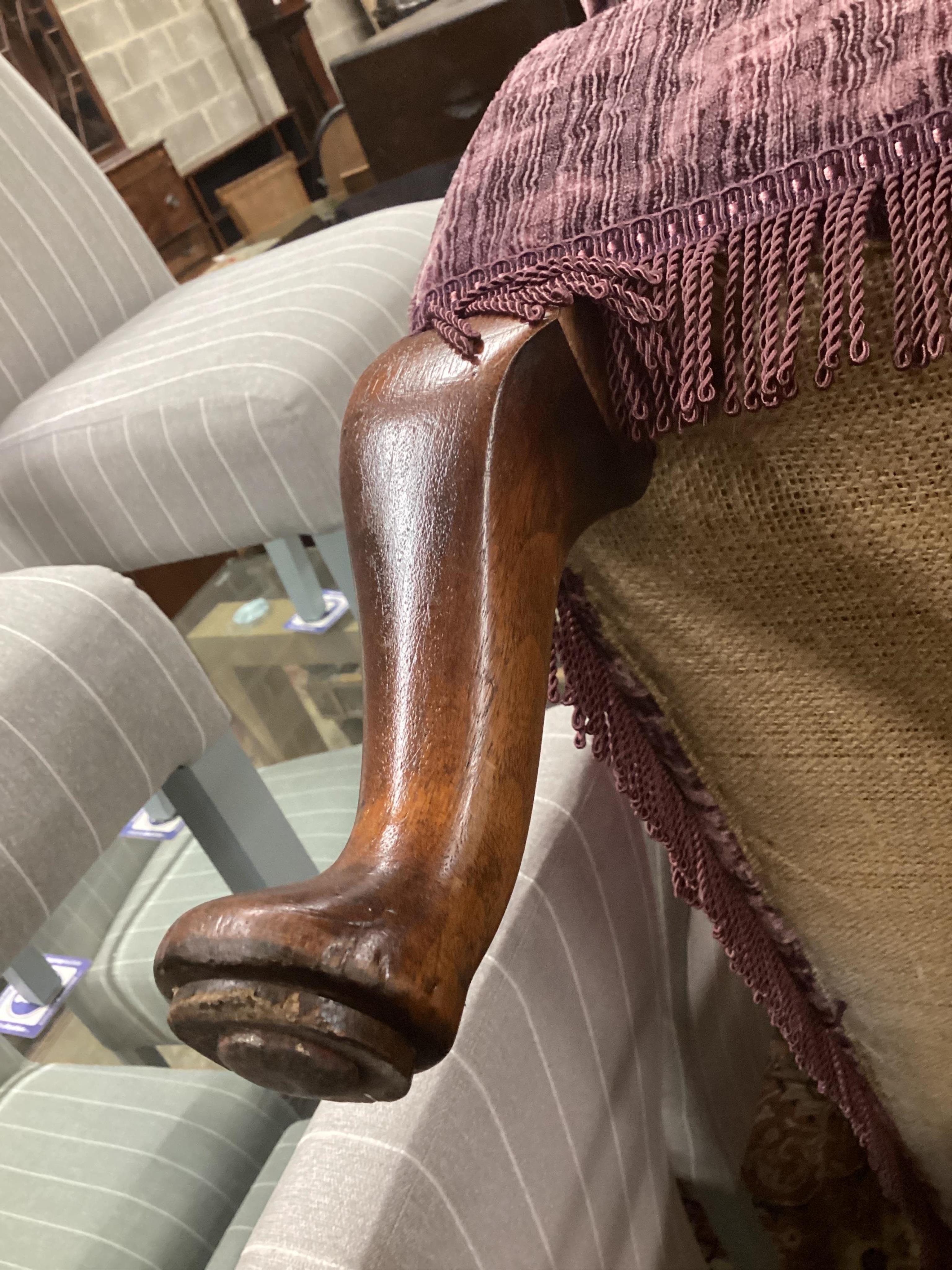An early 20th century day bed, re-upholstered in contemporary buttoned purple fabric, width 160cm, depth 67cm, height 84cm. Condition - good